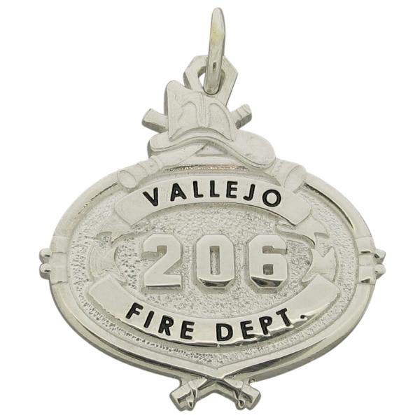 Custom Vallejo CA Fire Department badge pendant in sterling silver with raised numbers and black enamel.