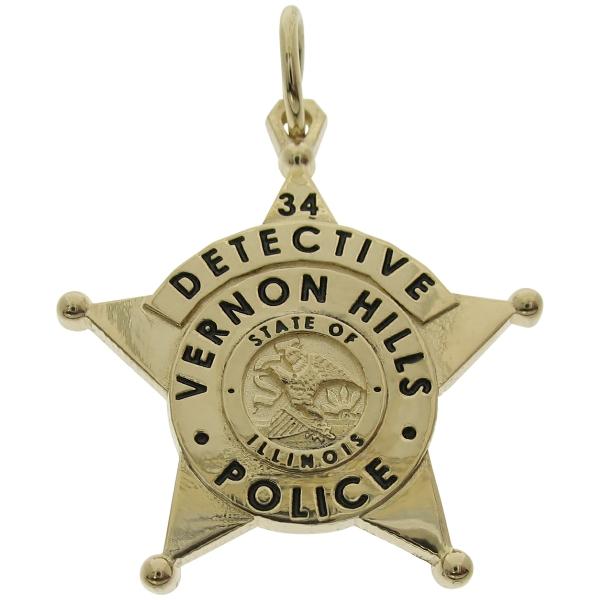 Custom Vernon Hills IL Police Detective badge pendant in 14k yellow gold with black enamel text.