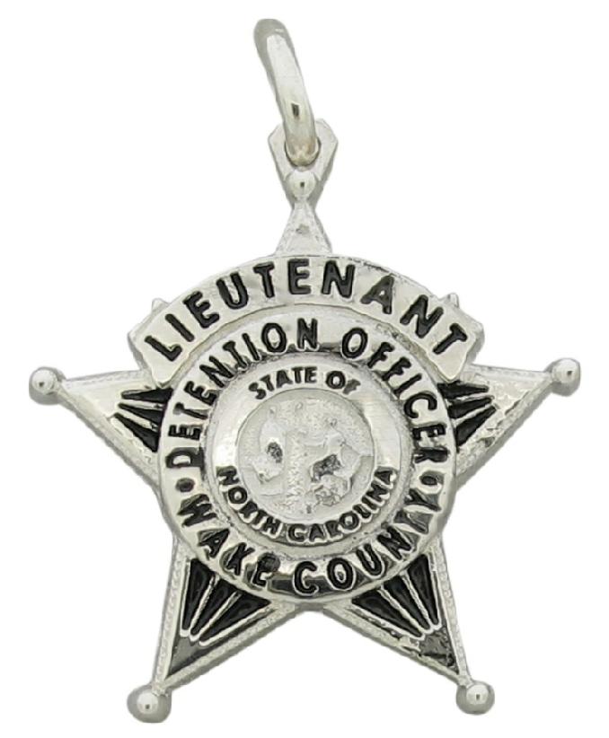 Custom Wake County (NC) Detention Officer badge charm in sterling silver with black enamel text.