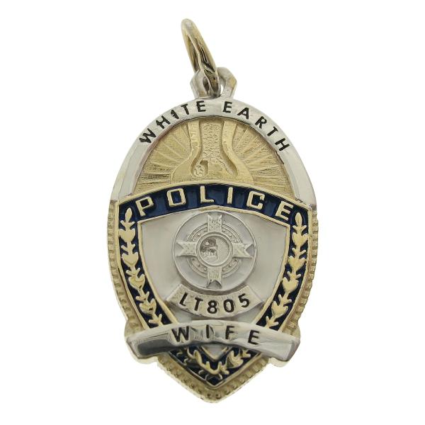 Custom White Earth MN Police Lieutenant badge pendant in two tone 10k gold with blue, white, and black enamel.