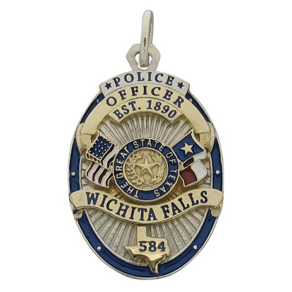 Custom Wichita Falls TX Police Officer badge pendant in sterling silver with gold plated highlights and red, white, and blue enamel.