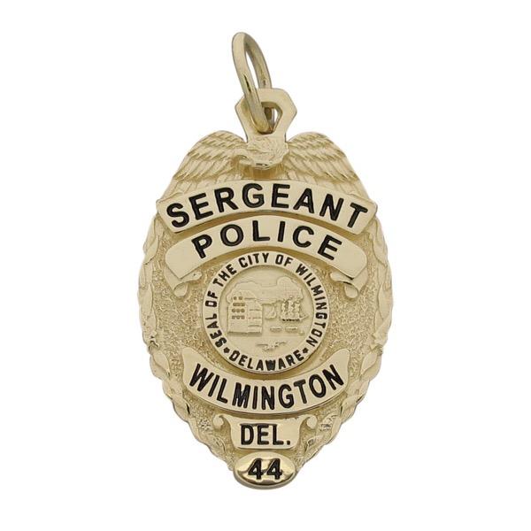 Custom Wilmington DE Police Sergeant badge pendant in 14k yellow gold with black enamel.
